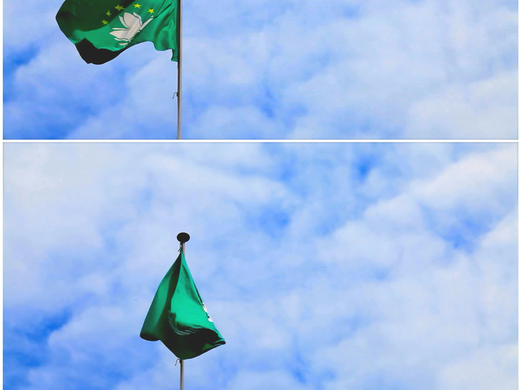 澳门区旗飘动没风了落下来特写高清视频素材